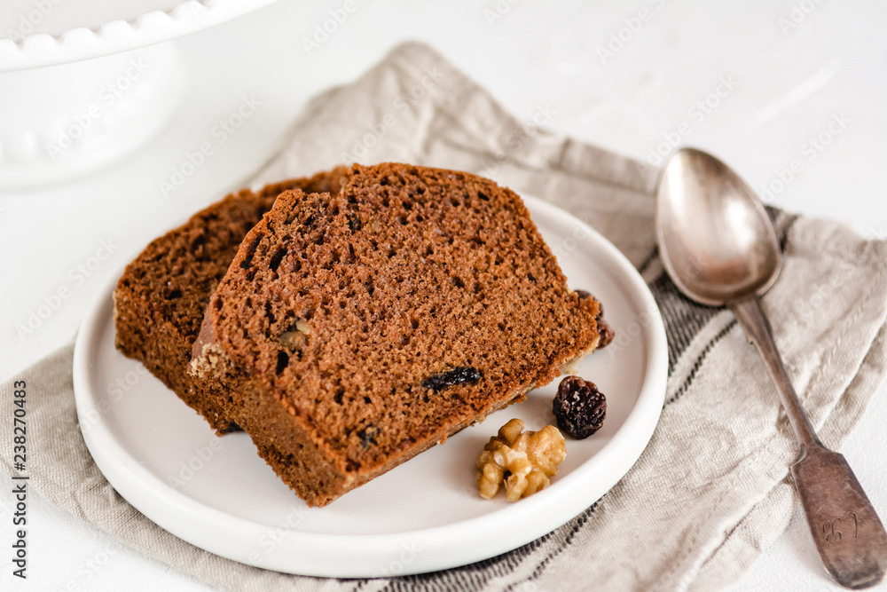 Homemade gingerbread cake on white plate. Honey cake. Homemade gingerbread cake on white plate. Honey cake.