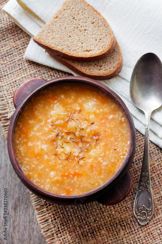 Kapustnyak - traditional ukrainian winter soup with sauerkraut, millet and meat