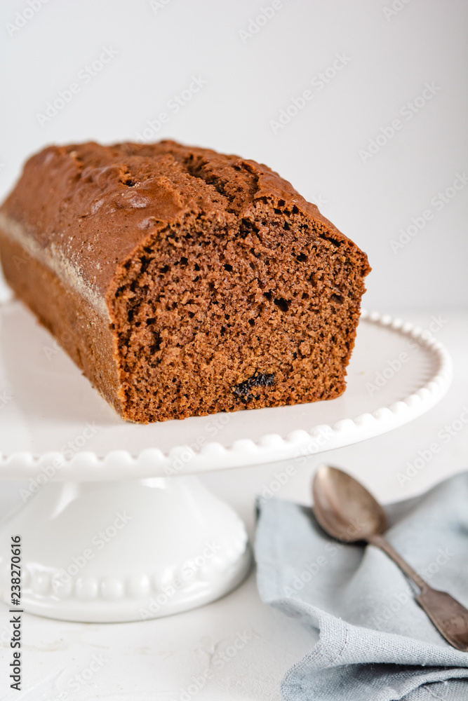 Homemade gingerbread cake on white plate. Honey cake. Homemade gingerbread cake on white plate. Honey cake.