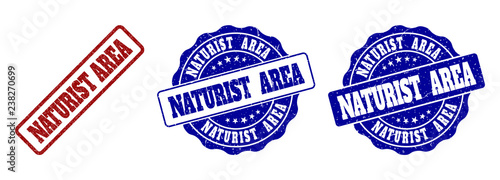 NATURIST AREA grunge stamp seals in red and blue colors. Vector NATURIST AREA watermarks with grainy effect. Graphic elements are rounded rectangles, rosettes, circles and text captions.