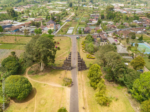 Aerial view of Ancient Bali gate with pathway in Bedugul village. North of Bali island, Indonesia