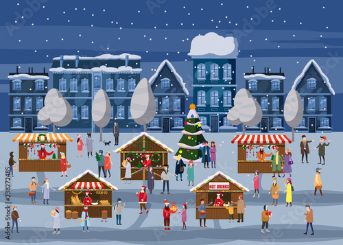 Christmas market or holiday outdoor fair on town square. Christmas tree. People walking between decorated stalls, canopy or kiosks, buying snacks,gifts, decoration and drinking hot coffe, tea and