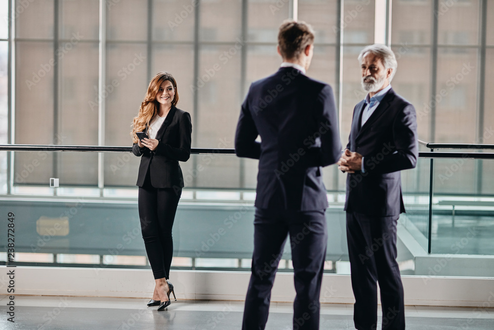 beautiful and successfull business woman in her 30´ in a corporate building beautiful and successfull business woman in her 30´ in a corporate building