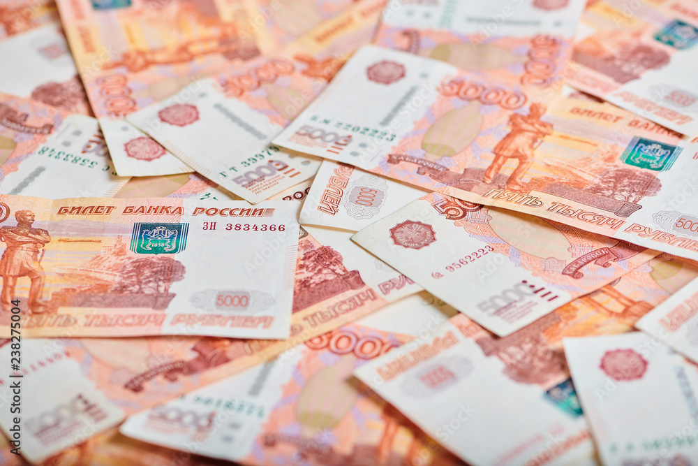 A lot of russian money banknotes of roubles, background A lot of russian money banknotes of roubles, background