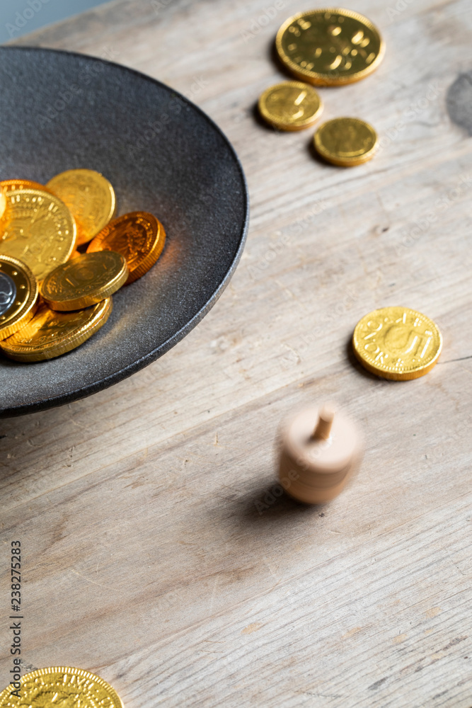 Dreidel game played with chocolate geltwood Dreidel game played with chocolate geltwood