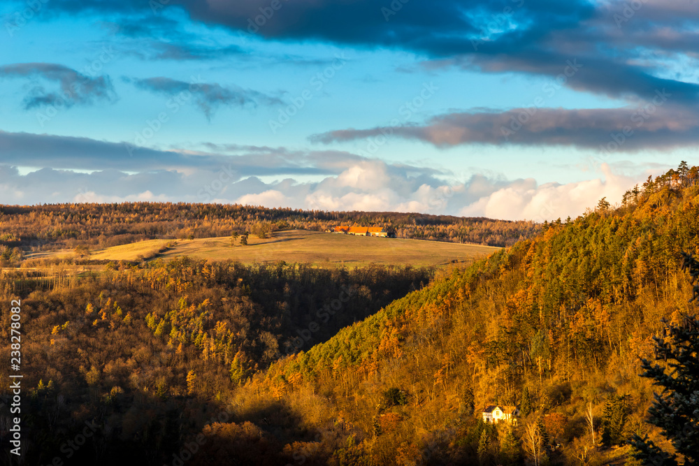 Autumn hills and meadows at sunset.