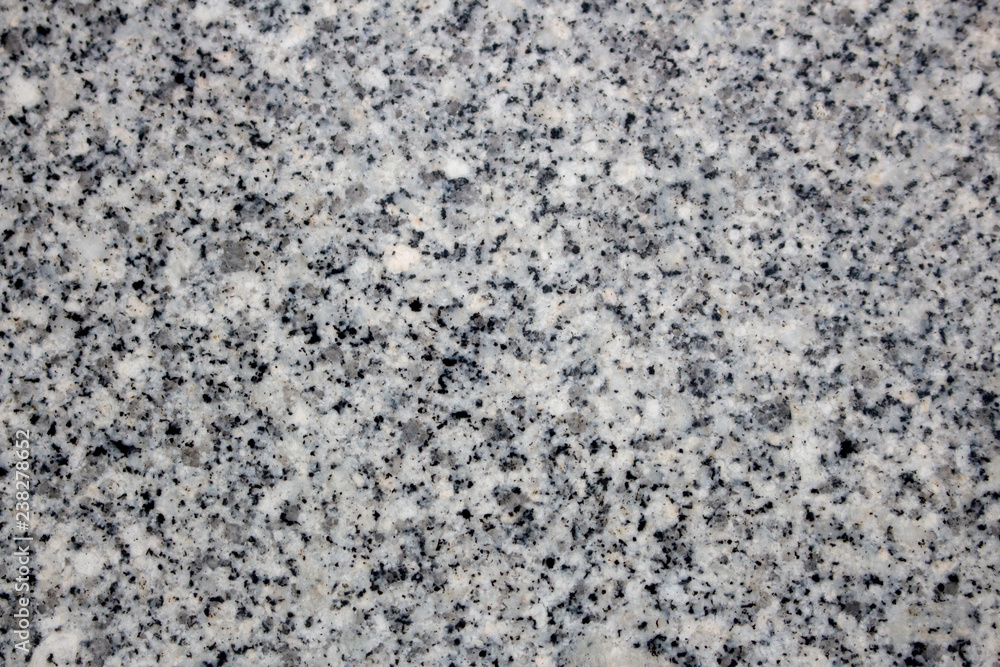 Natural granite stone surface. Black, gray and white colored granite texture. Natural granite stone surface. Black, gray and white colored granite texture.
