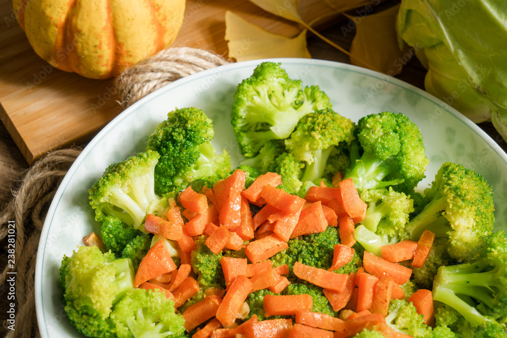Green broccoli with wooden background Green broccoli with wooden background