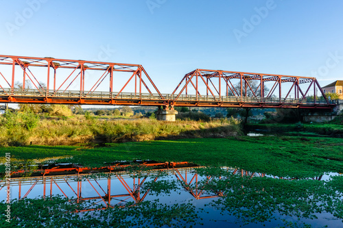 metal bridge red color in raposa, almeirim, portugal.