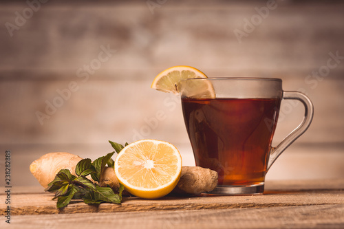 cup with tea, mint, lemon and ginger 