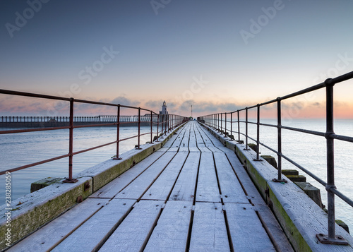 Frosty morning at South Pier  Blyth Harbour  Northumberland  England  UK.