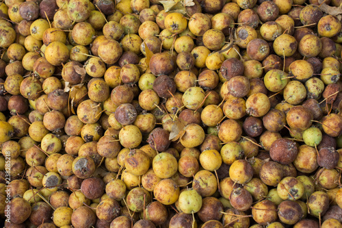 Wild fruit azarole, mediterranean medlar collected and sold in market photo