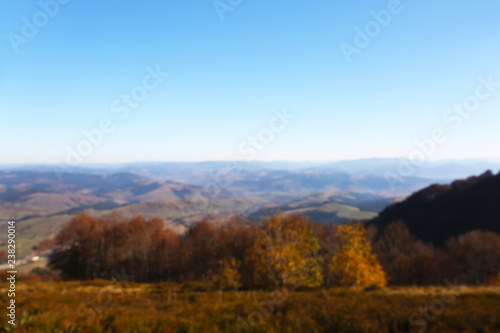 Beautiful mountain landscape with blue sky on sunny day, blurred view © New Africa