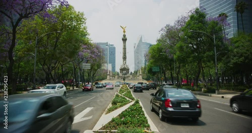 Local people and their morning commute near Angle De La Independancia Reforma in Mexico City.  photo