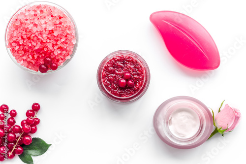 homemade spa with wineberry cosmetic set on white background top view photo