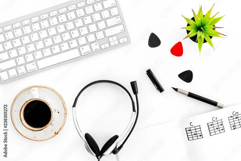 Headphone with paper note, keyboard and coffee in music studio for dj or musician work white background top view - obrazy, fototapety, plakaty 