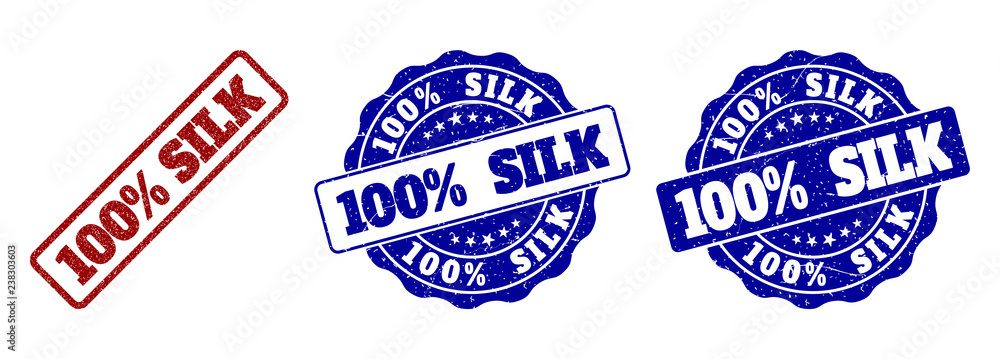100% SILK grunge stamp seals in red and blue colors. Vector 100% SILK labels with scratced style. Graphic elements are rounded rectangles, rosettes, circles and text labels. 100% SILK grunge stamp seals in red and blue colors. Vector 100% SILK labels with scratced style. Graphic elements are rounded rectangles, rosettes, circles and text labels.