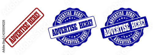 ADVERTISE HERE! scratched stamp seals in red and blue colors. Vector ADVERTISE HERE! overlays with grunge style. Graphic elements are rounded rectangles, rosettes, circles and text tags.