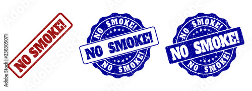 NO SMOKE! scratched stamp seals in red and blue colors. Vector NO SMOKE! labels with grainy effect. Graphic elements are rounded rectangles, rosettes, circles and text labels.
