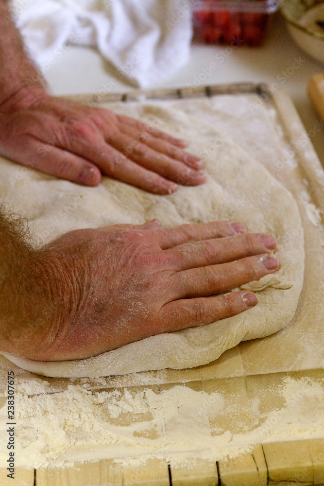 Man Kneading Bread Dough