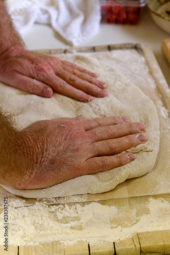 Man Kneading Bread Dough