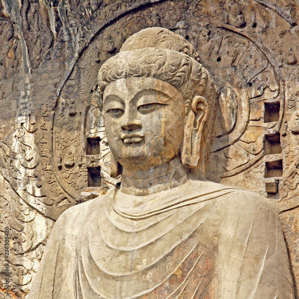 Longmen Grottoe : The Buddha sculpture of Fengxian Cave (or Li Zhi Cave) The world heritage site, Chinese Buddhist art. Located in Louyang, Henan province China. Selective focus.