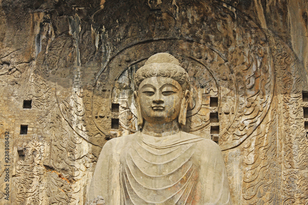 Longmen Grottoe : The Buddha sculpture of Fengxian Cave (or Li Zhi Cave) The world heritage site, Chinese Buddhist art. Located in Louyang, Henan province China. Selective focus.