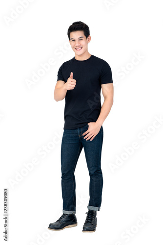 Casual smiling handsome Asian man giving thumbs up