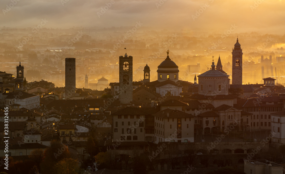 Bergamo, one of the most beautiful city in Italy. Lombardy. Amazing landscape of the old town and the fog covers the plain