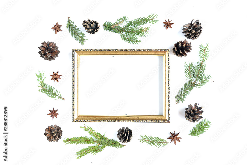 Christmas composition of fir branches, anise and cones isolated on white background.