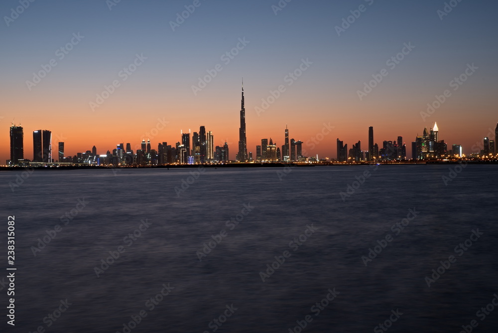 Dubai slyline from Dubai Creek Harbour and Dubai canal to Downtown and Business Bay, United Arab Emirates