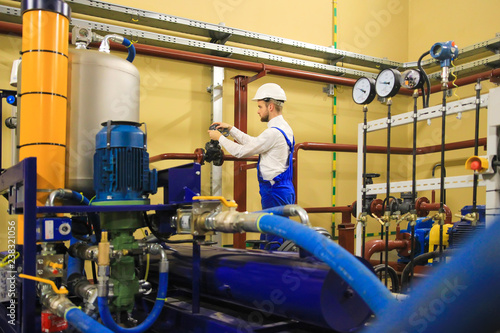 Technician on power industrial plant