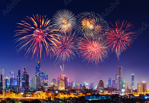 Happy new year firework with Bandkok cityscape at night