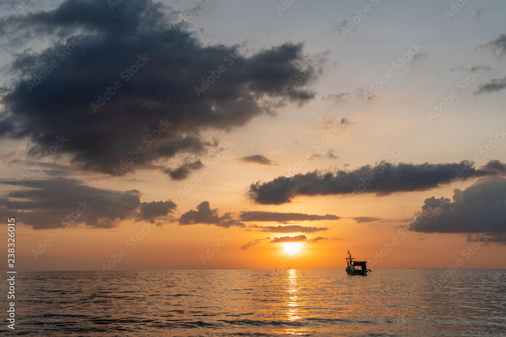 Beach sunset and fisherman boat for commercial background