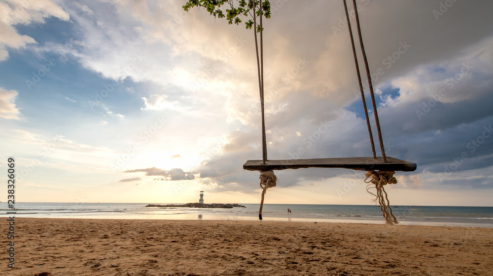 Swing wood on the beach for travel background Swing wood on the beach for travel background