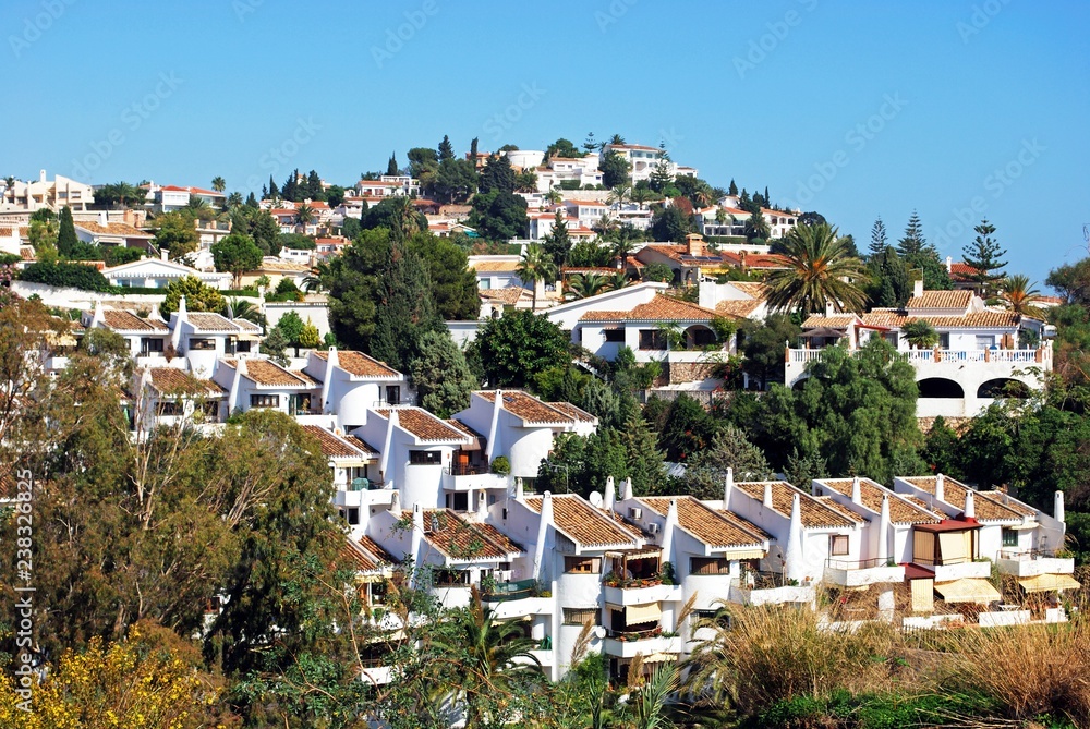 Traditional Spanish villas and houses on the hillside, Benalmadena Costa, Spain.