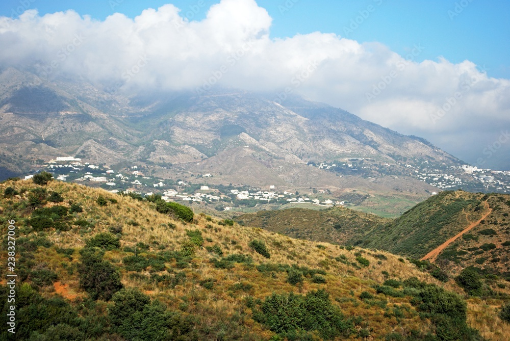 View across countryside towards the Sierra de Mijas mountains near Fuengirola, Spain.
