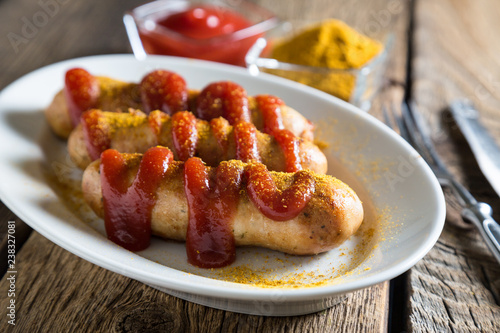 Curry wurst. German sausages with ketchup and curry