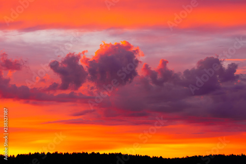 Bright morning sky with flaming red  orange and purple clouds