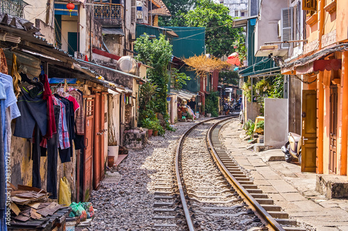 Hanoi city railway Perspective view running along narrow street with houses in Vietnam