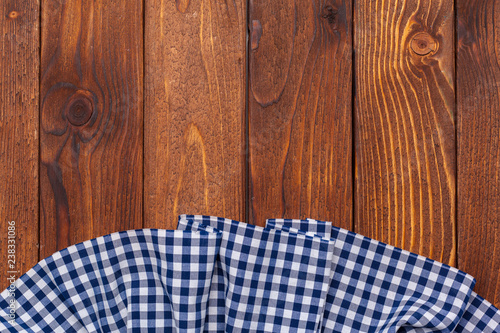 checkered tablecloth on wooden table