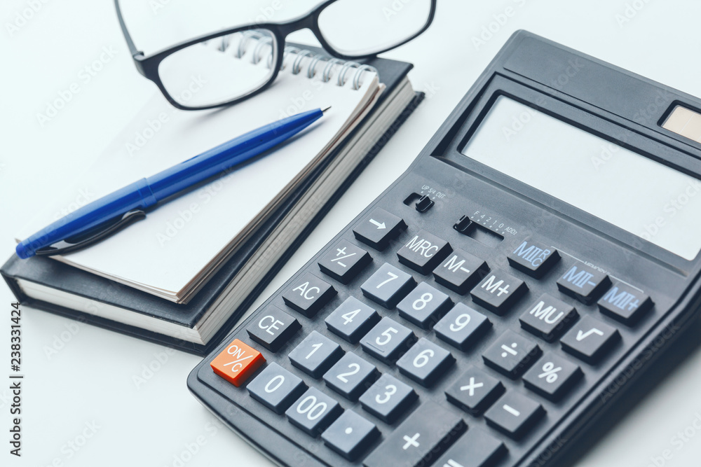 Business still life with calculator on table in office. Business still life with calculator on table in office.