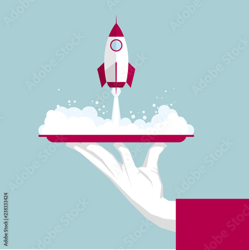 The rocket launches in the tray.Isolated on blue background.