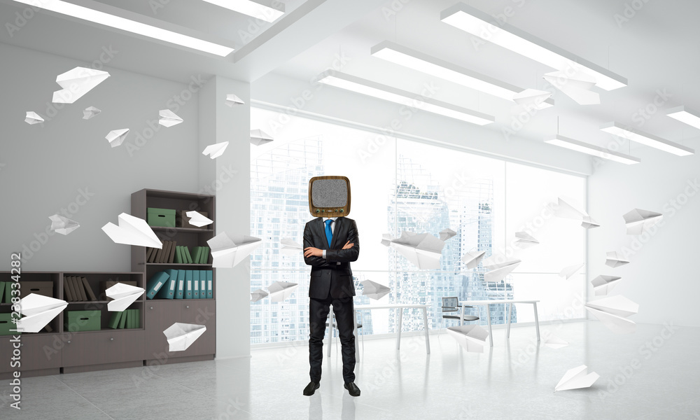 Businessman with an old TV instead of head. Businessman with an old TV instead of head.