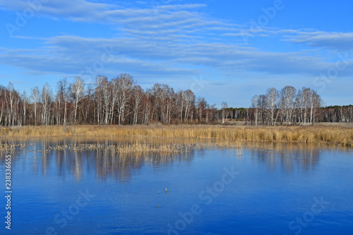 Natural monument - lake Uvildy in late autumn in clear weather, Chelyabinsk region. Russia