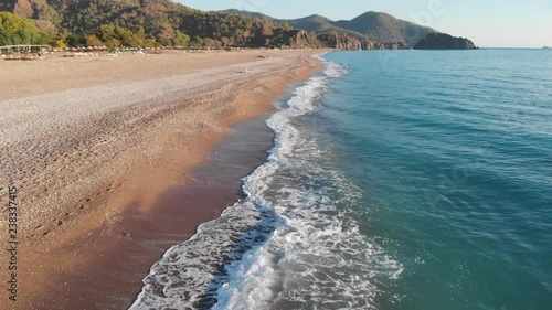 Seashore and waves in Turkey, the Mediterranean Sea. Shooting from the drone.