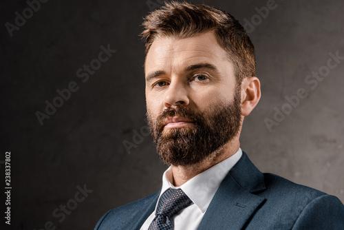 close up of serious bearded businessman in formalwear © LIGHTFIELD STUDIOS