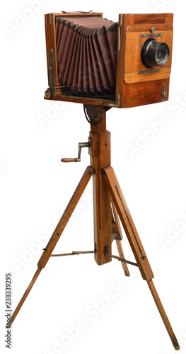 Vintage wood foldable camera on wooden tripod 