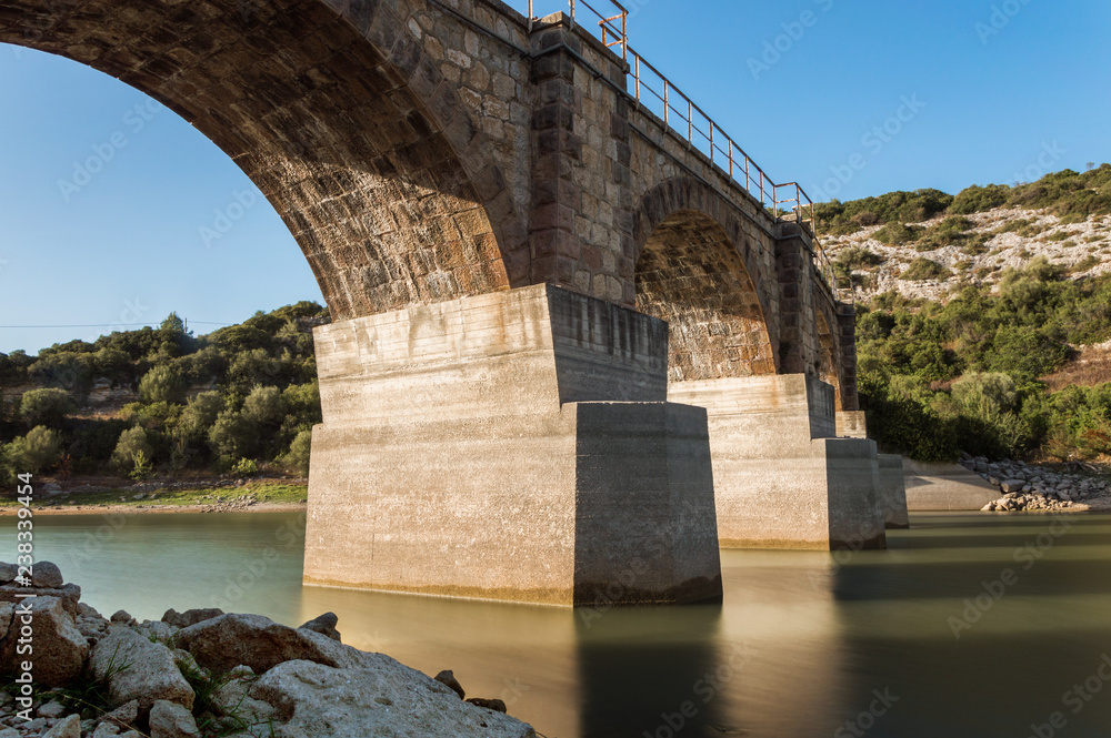 View Lake Barrocus from Railway train bridge in Isili town in the historical region of Sarcidano, province of South Sardinia.Italy View Lake Barrocus from Railway train bridge in Isili town in the historical region of Sarcidano, province of South Sardinia.Italy