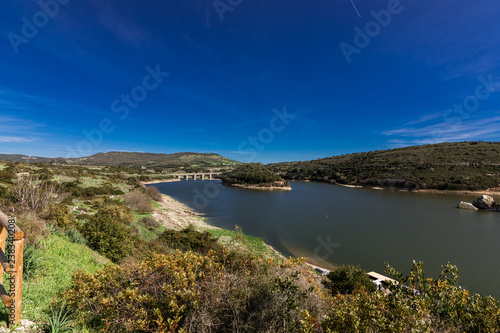 San Sebastian touristic island and church in Lake Barrocus in Isili town in the historical region of Sarcidano, province of South Sardinia. Italy